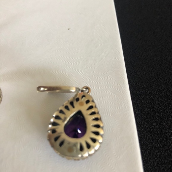 Silver ring with matching earring. Purple center - Picture 2 of 2